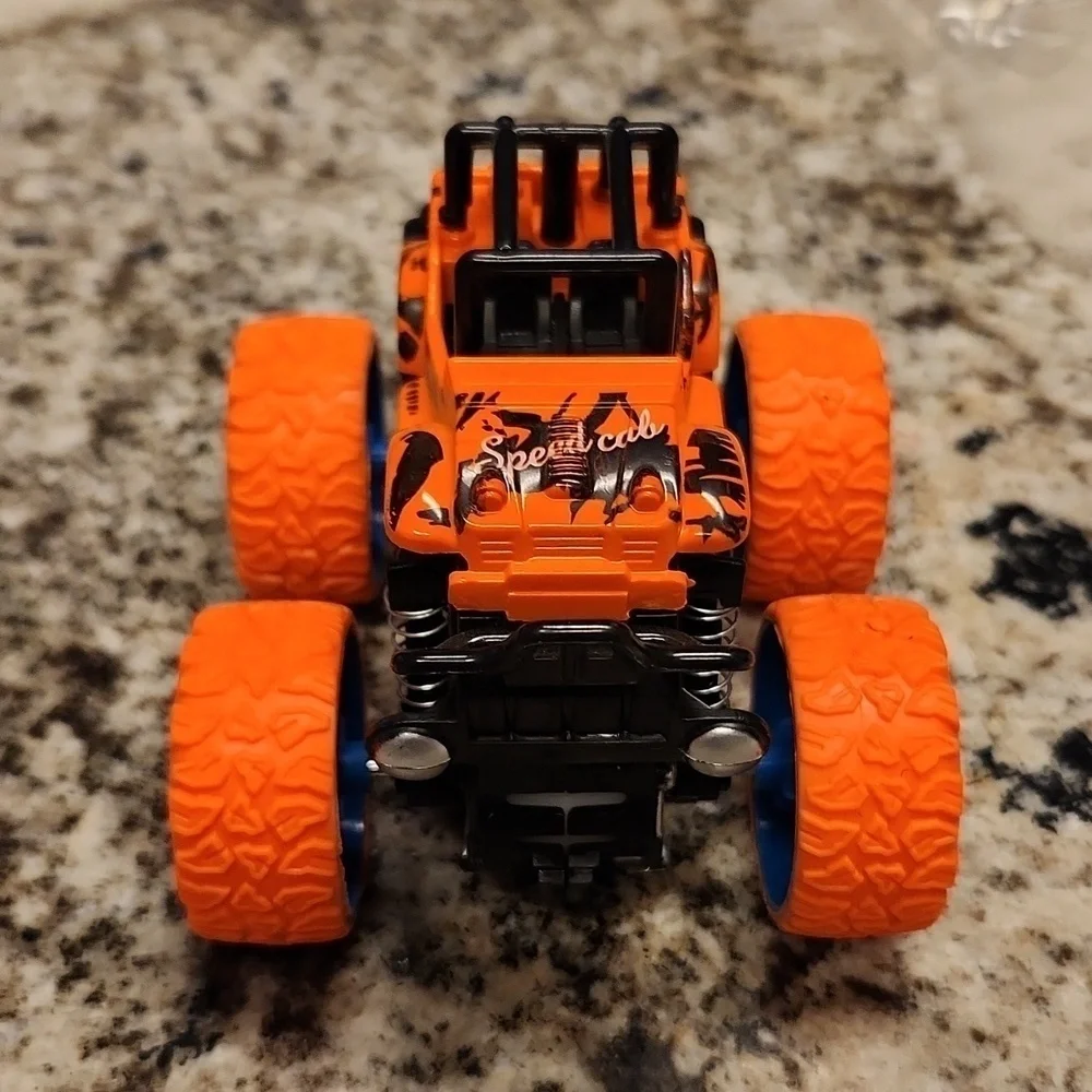 Jeep monster truck reve up car orange black